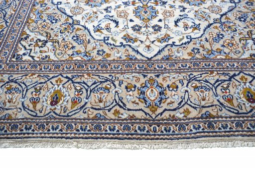 Close-up detail of 2000s Kashan rug from Iran / Persia showing Wool weave