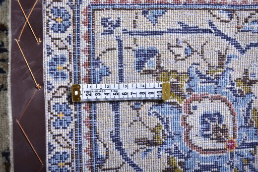Surface texture of 2000s Kashan rug with natural Wool and intricate pattern