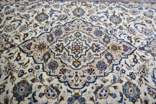 Central medallion detail of 2000s Kashan rug from Iran / Persia