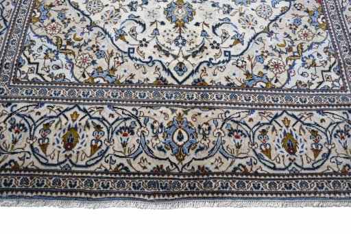 Close-up detail of 2000s Kashan rug from Iran / Persia showing Wool weave