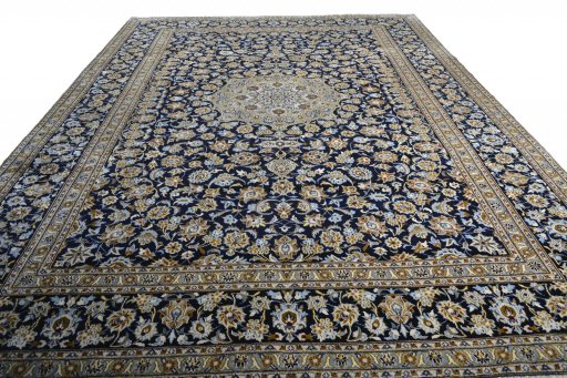 Surface texture of 2000s Kashan rug with natural Wool and intricate pattern