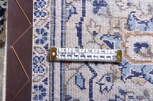 Surface texture of 2000s Kashan rug with natural Wool and intricate pattern