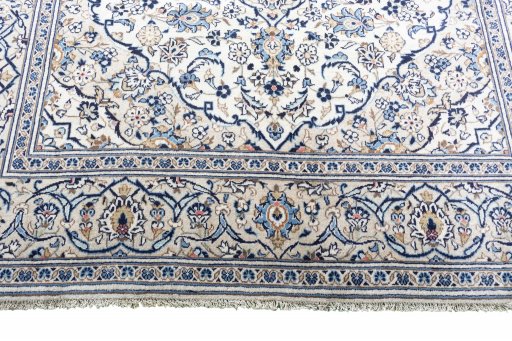 Close-up detail of 2000s Kashan rug from Iran / Persia showing Wool weave