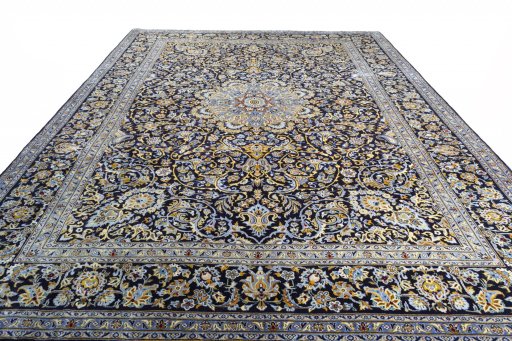 Surface texture of 2000s Kashan rug with natural Wool and intricate pattern