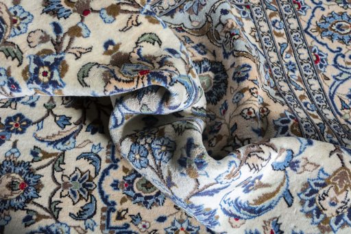 Close-up detail of 2000s Kashan rug from Iran / Persia showing Wool weave