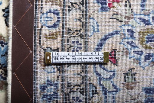 Surface texture of 2000s Kashan rug with natural Wool and intricate pattern