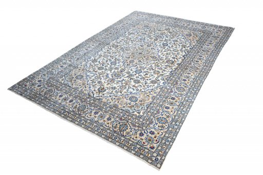 Corner detail of 2000s Kashan rug showing border pattern and Wool pile