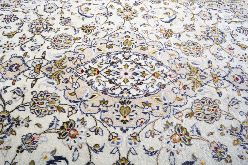 Central medallion detail of 2000s Kashan rug from Iran / Persia