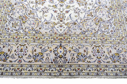 Close-up detail of 2000s Kashan rug from Iran / Persia showing Wool weave