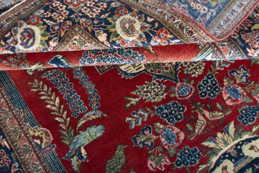 Close-up detail of 1930s Kashan rug from Iran / Persia showing Wool weave
