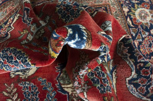 Surface texture of 1930s Kashan rug with natural Wool and intricate pattern