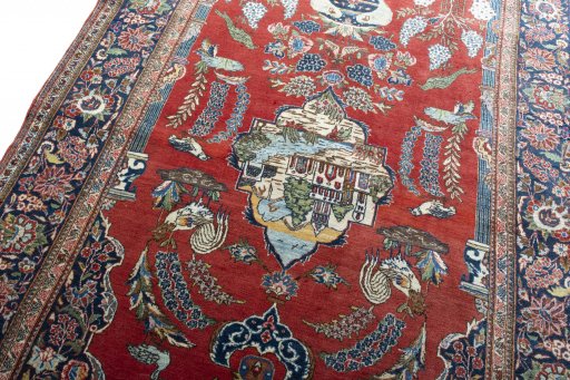 Backside of handmade 1930s Kashan rug showing knot structure and weave density