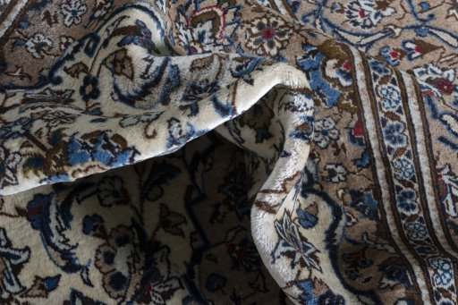 Close-up detail of 2000s Kashan rug from Iran / Persia showing Wool weave