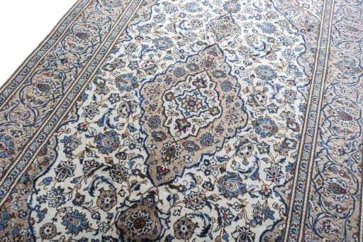 Backside of handmade 2000s Kashan rug showing knot structure and weave density