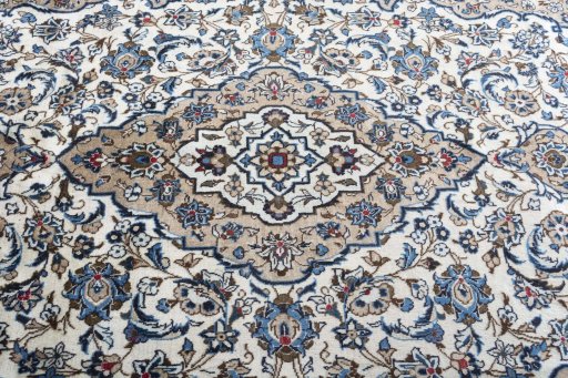 Central medallion detail of 2000s Kashan rug from Iran / Persia