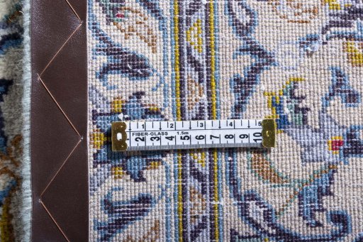 Surface texture of 2000s Kashan rug with natural Wool and intricate pattern