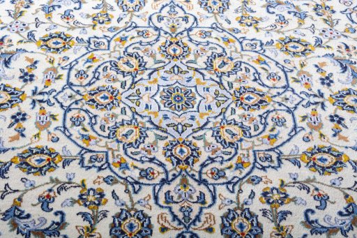 Central medallion detail of 2000s Kashan rug from Iran / Persia