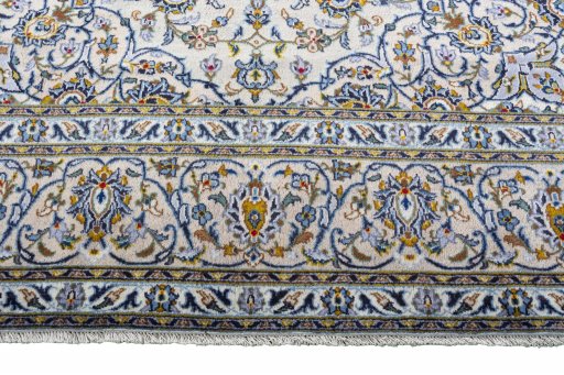 Close-up detail of 2000s Kashan rug from Iran / Persia showing Wool weave