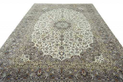 Surface texture of 2000s Kashan rug with natural Wool and intricate pattern