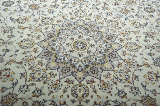 Central medallion detail of 2000s Kashan rug from Iran / Persia