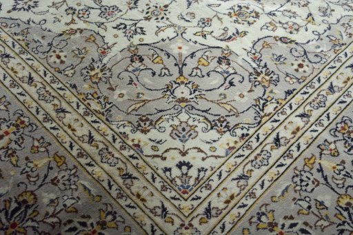 Close-up detail of 2000s Kashan rug from Iran / Persia showing Wool weave