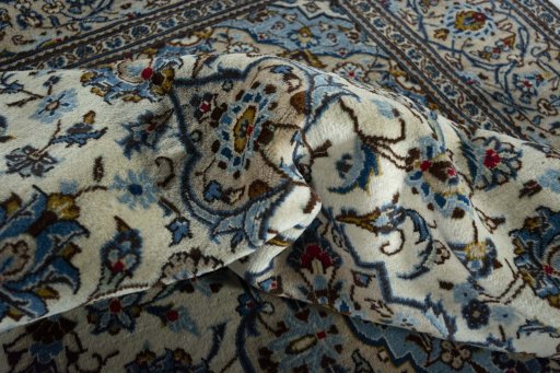 Close-up detail of 2000s Kashan rug from Iran / Persia showing Wool weave