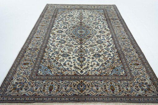 Surface texture of 2000s Kashan rug with natural Wool and intricate pattern