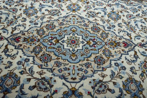 Central medallion detail of 2000s Kashan rug from Iran / Persia