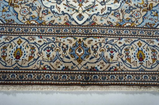 Close-up detail of 2000s Kashan rug from Iran / Persia showing Wool weave