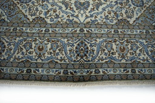 Close-up detail of 2000s Kashan rug from Iran / Persia showing Wool weave