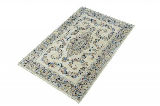 Corner detail of New Kashan rug showing border pattern and Wool pile