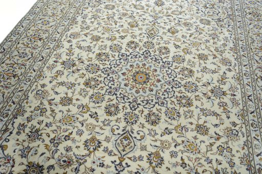 Surface texture of 2000s Kashan rug with natural Wool and intricate pattern