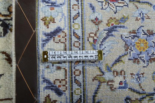 Close-up detail of 2000s Kashan rug from Iran / Persia showing Wool weave