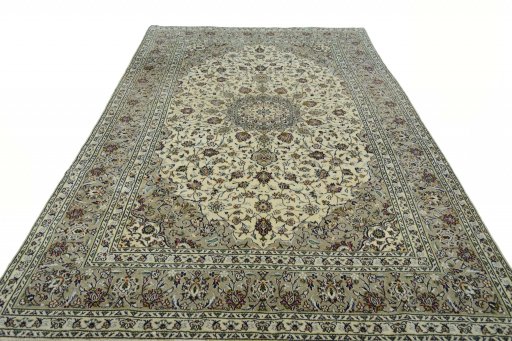 Surface texture of 2000s Kashan rug with natural Wool and intricate pattern
