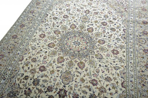 Backside of handmade 2000s Kashan rug showing knot structure and weave density
