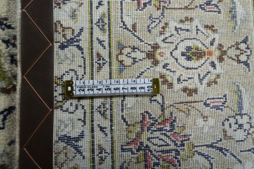 Close-up detail of 2000s Kashan rug from Iran / Persia showing Wool weave
