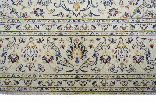 Close-up detail of New Kashan rug from Iran / Persia showing Wool weave