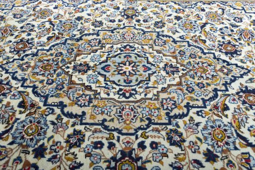 Central medallion detail of 2000s Kashan rug from Iran / Persia