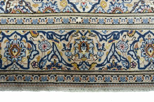 Close-up detail of 2000s Kashan rug from Iran / Persia showing Wool weave