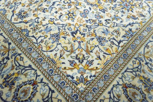 Close-up detail of New Kashan rug from Iran / Persia showing Wool weave