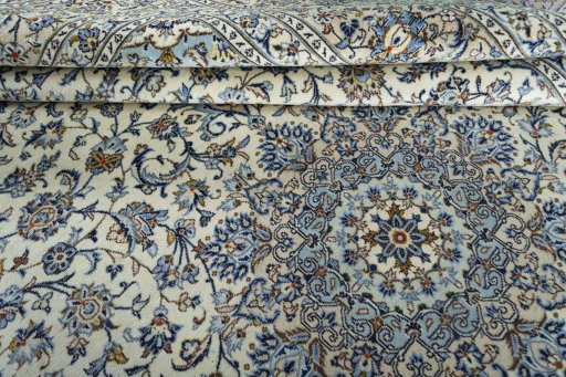 Close-up detail of 2000s Kashan rug from Iran / Persia showing Wool weave