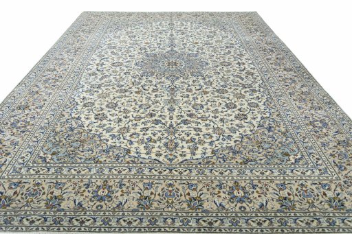 Surface texture of 2000s Kashan rug with natural Wool and intricate pattern