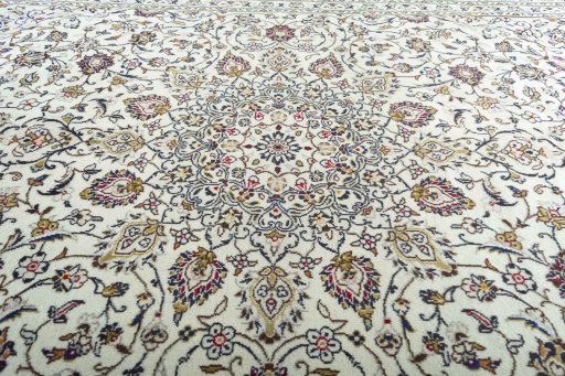 Central medallion detail of 2000s Kashan rug from Iran / Persia