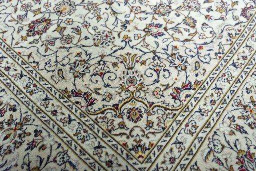 Close-up detail of 2000s Kashan rug from Iran / Persia showing Wool weave