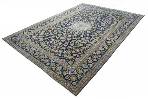 Corner detail of 2000s Kashan rug showing border pattern and Wool pile
