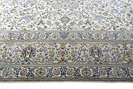 Close-up detail of 2000s Kashan rug from Iran / Persia showing Wool weave