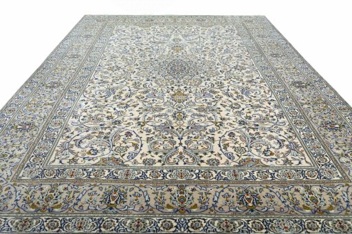 Backside of handmade 2000s Kashan rug showing knot structure and weave density