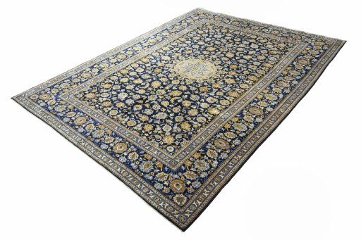 Corner detail of 2000s Kashan rug showing border pattern and Wool pile
