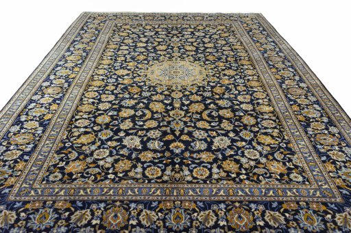 Surface texture of 2000s Kashan rug with natural Wool and intricate pattern