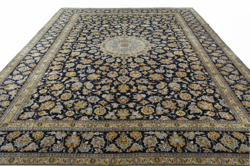 Surface texture of 2000s Kashan rug with natural Wool and intricate pattern